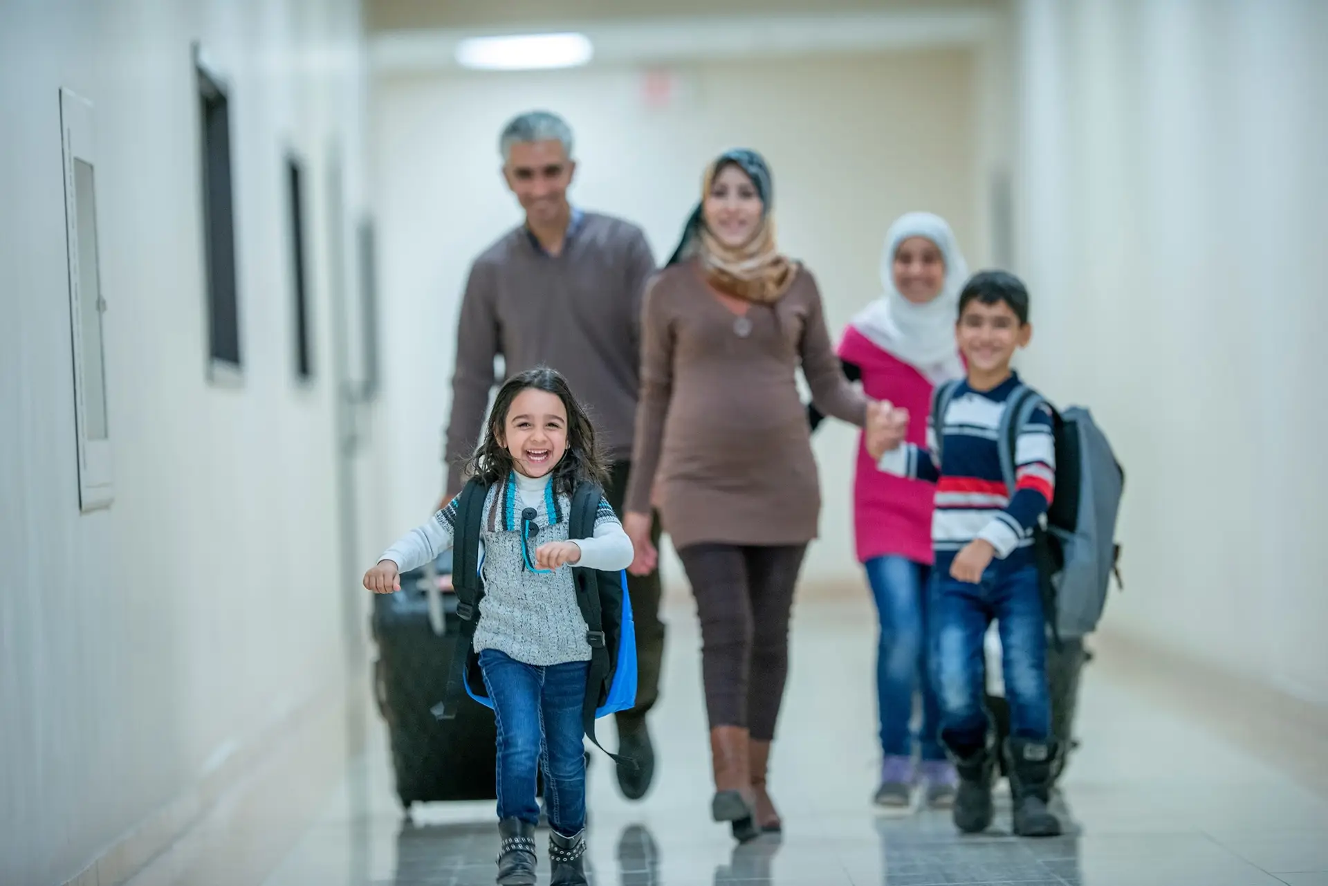 AFGHAN FAMILY ARRIVING AT SYDNEY AIRPORT